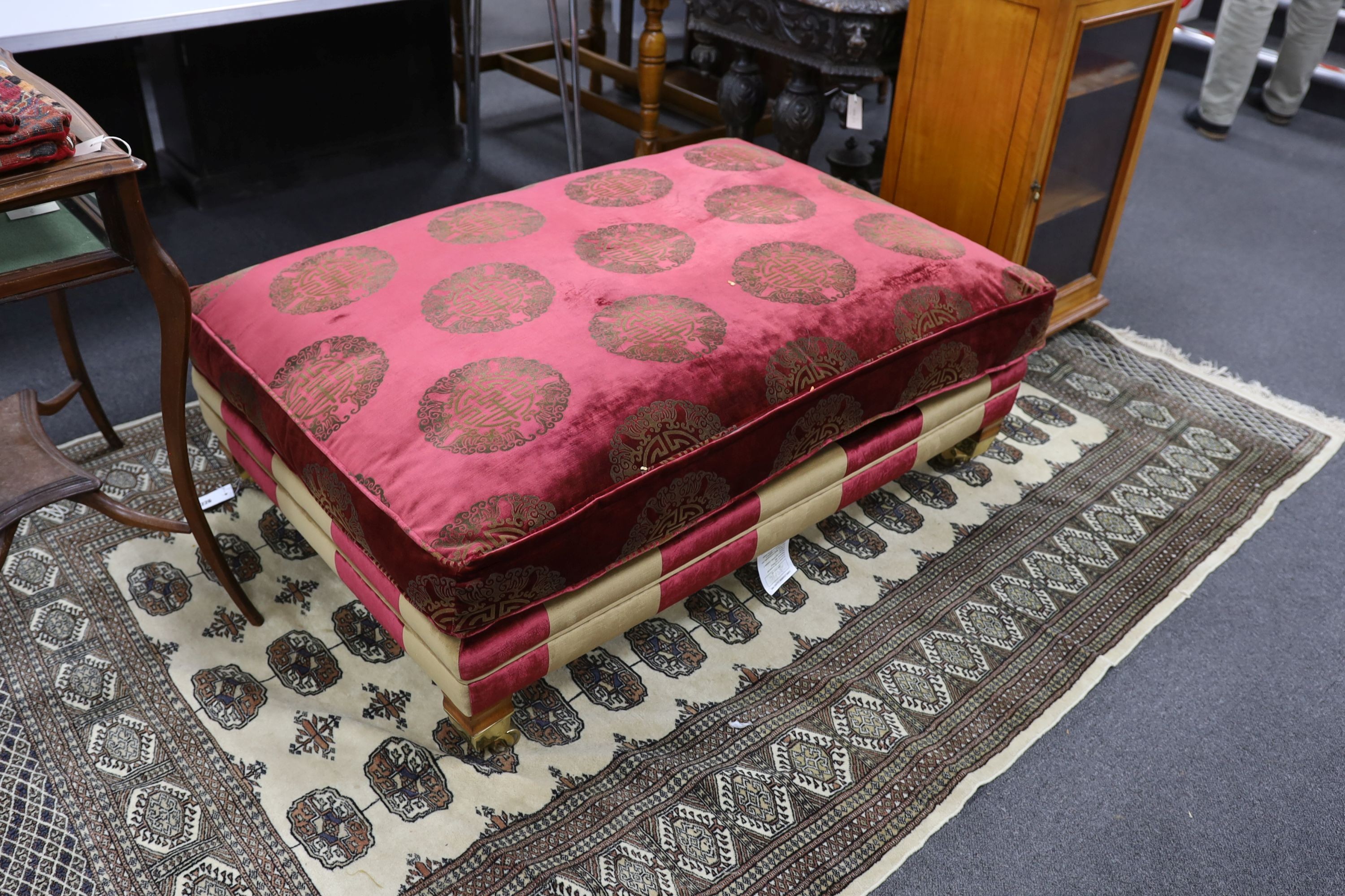 A large Duresta rectangular footstool upholstered in a Chinese style fabric, length 122cm, depth 84cm, height 40cm